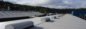 A line of Mackridge natural ridge ventilators in-situ on a roof in Todmorden